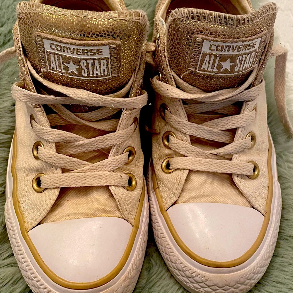 White and Gold Converse Sneakers.